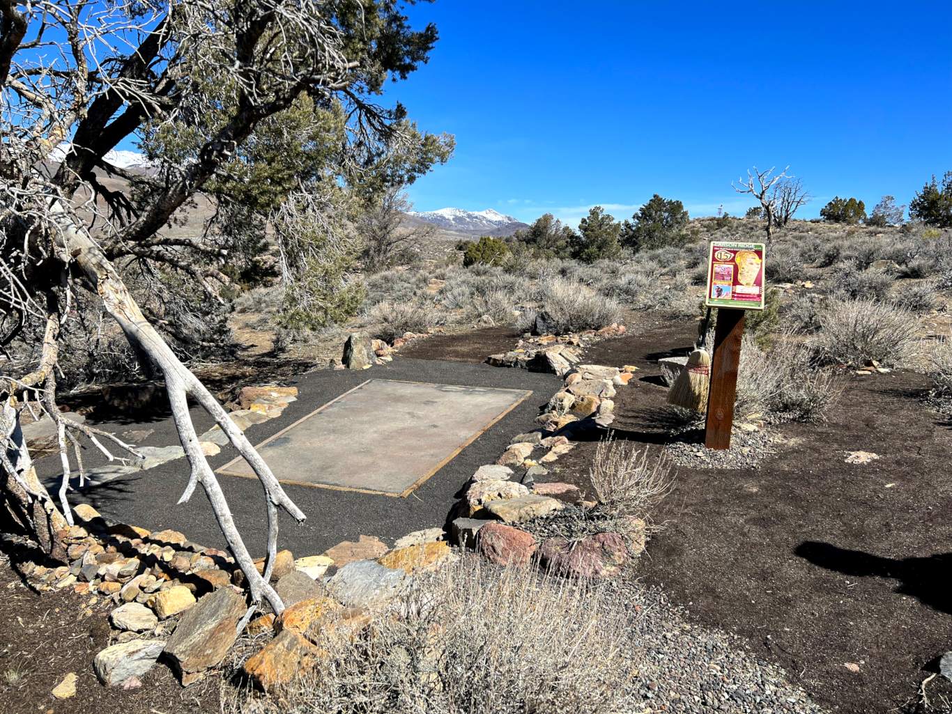 a decorative tee area with native rock terracing