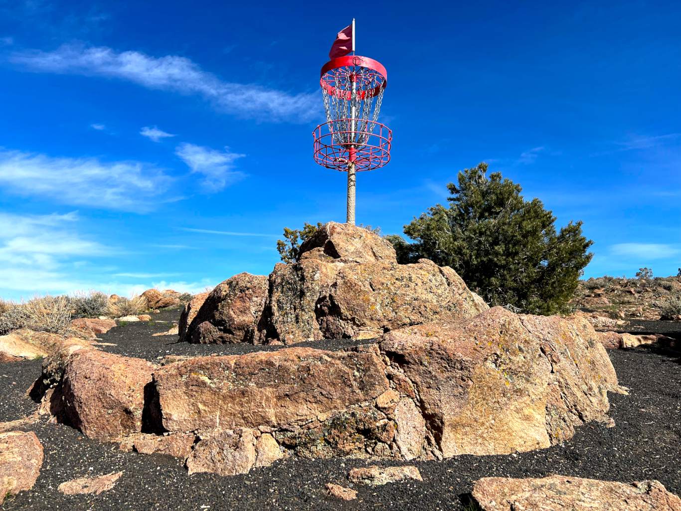 close-up of native rock pyramid with basket on top
